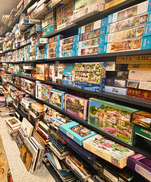 Puzzle section inside Flutterbuy Books and More Cape Coral Florida